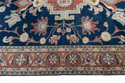 Corner detail of New Sarough rug showing border pattern and Wool pile