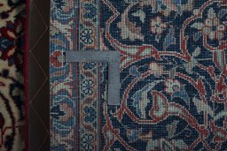 Backside of handmade 2000s Sarough rug showing knot structure and weave density