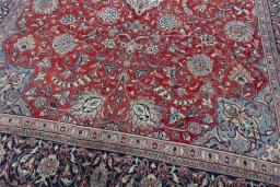 Close-up detail of 2000s Sarough rug from Iran / Persia showing Wool weave