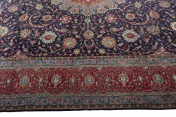 Corner detail of 2000s Sarough rug showing border pattern and Wool pile
