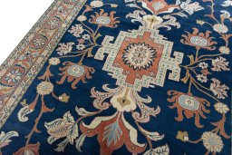 Backside of handmade New Sarough rug showing knot structure and weave density