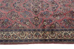 Corner detail of 1970s Sarough rug showing border pattern and Wool pile