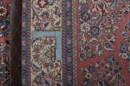 Backside of handmade 1970s Sarough rug showing knot structure and weave density