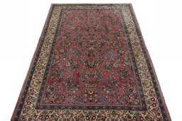 Surface texture of 1970s Sarough rug with natural Wool and intricate pattern