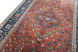 Backside of handmade New Sarough rug showing knot structure and weave density