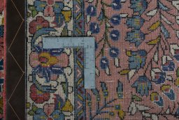 Surface texture of 2000s Sarough rug with natural Wool and intricate pattern
