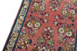 Backside of handmade New Sarough rug showing knot structure and weave density
