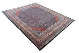 Close-up detail of 1970s Sarough rug from Iran / Persia showing Wool weave