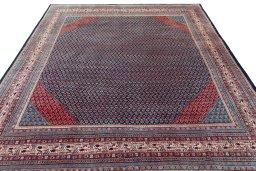 Surface texture of 1970s Sarough rug with natural Wool and intricate pattern