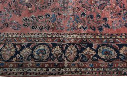 Corner detail of 1930s Sarough rug showing border pattern and Cork pile