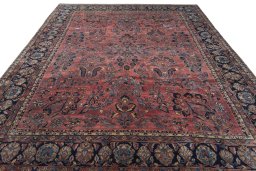 Surface texture of 1930s Sarough rug with natural Cork and intricate pattern