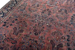 Backside of handmade 1930s Sarough rug showing knot structure and weave density