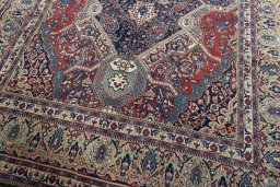 Close-up detail of 2000s Sarough rug from Iran / Persia showing Wool weave