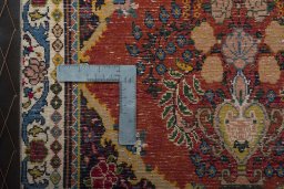 Corner detail of 2000s Sarough rug showing border pattern and Wool pile