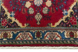 Close-up detail of 2000s Sarough rug from Iran / Persia showing Wool weave
