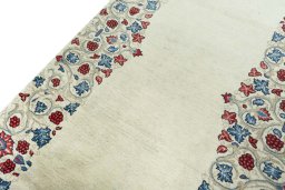 Backside of handmade 1970s Sarough rug showing knot structure and weave density