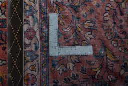Corner detail of 2000s Sarough rug showing border pattern and Wool pile
