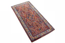 Close-up detail of 2000s Sarough rug from Iran / Persia showing Wool weave