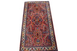Surface texture of 2000s Sarough rug with natural Wool and intricate pattern