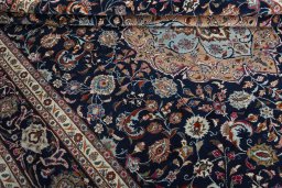 Close-up detail of 2000s Sarough rug from Iran / Persia showing Wool weave