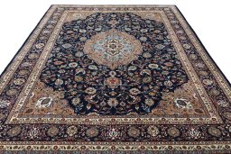 Surface texture of 2000s Sarough rug with natural Wool and intricate pattern