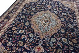 Backside of handmade 2000s Sarough rug showing knot structure and weave density