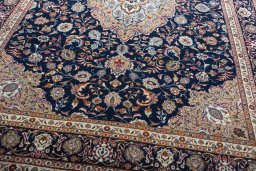 Close-up detail of 2000s Sarough rug from Iran / Persia showing Wool weave