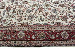 Corner detail of 2000s Sarough rug showing border pattern and Wool pile