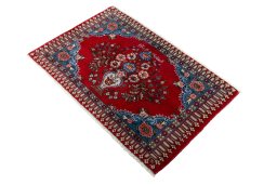 Corner detail of 2000s Sarough rug showing border pattern and Wool pile