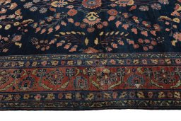 Corner detail of 1930s Sarough rug showing border pattern and Cork pile