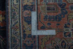 Backside of handmade 1930s Sarough rug showing knot structure and weave density