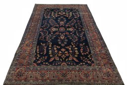 Surface texture of 1930s Sarough rug with natural Cork and intricate pattern