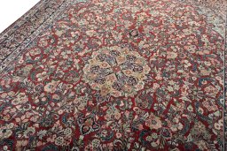 Backside of handmade 1950s Sarough rug showing knot structure and weave density