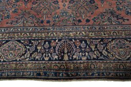 Corner detail of 1930s Sarough rug showing border pattern and Cork pile