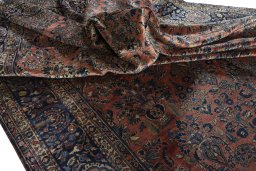 Backside of handmade 1930s Sarough rug showing knot structure and weave density