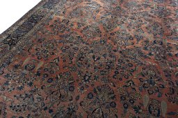Backside of handmade 1930s Sarough rug showing knot structure and weave density