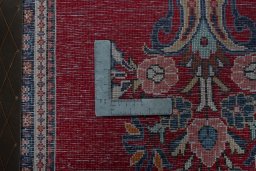 Backside of handmade 2000s Sarough rug showing knot structure and weave density
