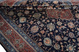 Close-up detail of 2000s Sarough rug from Iran / Persia showing Wool weave