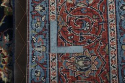 Backside of handmade 2000s Sarough rug showing knot structure and weave density