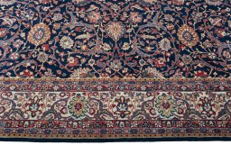 Corner detail of 1970s Sarough rug showing border pattern and Wool pile