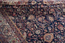 Close-up detail of 1970s Sarough rug from Iran / Persia showing Wool weave