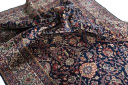 Surface texture of 1970s Sarough rug with natural Wool and intricate pattern