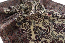 Surface texture of 1930s Sarough rug with natural Cork and intricate pattern