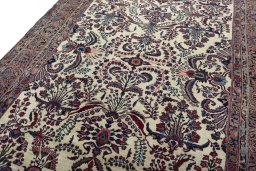 Backside of handmade 1930s Sarough rug showing knot structure and weave density