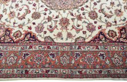 Corner detail of 2000s Sarough rug showing border pattern and Wool pile