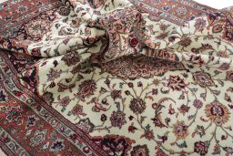 Surface texture of 2000s Sarough rug with natural Wool and intricate pattern