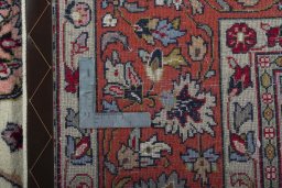 Backside of handmade 2000s Sarough rug showing knot structure and weave density