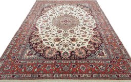 Surface texture of 2000s Sarough rug with natural Wool and intricate pattern