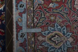 Backside of handmade 1970s Sarough rug showing knot structure and weave density