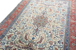 Backside of handmade New Sarough rug showing knot structure and weave density